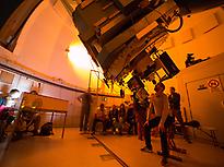 Look through a professional telescope